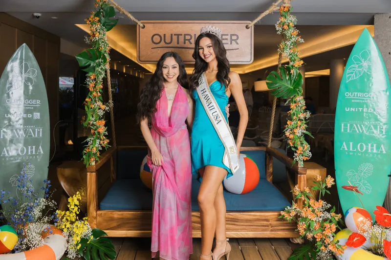 Guests posing at a corporate pool party activation