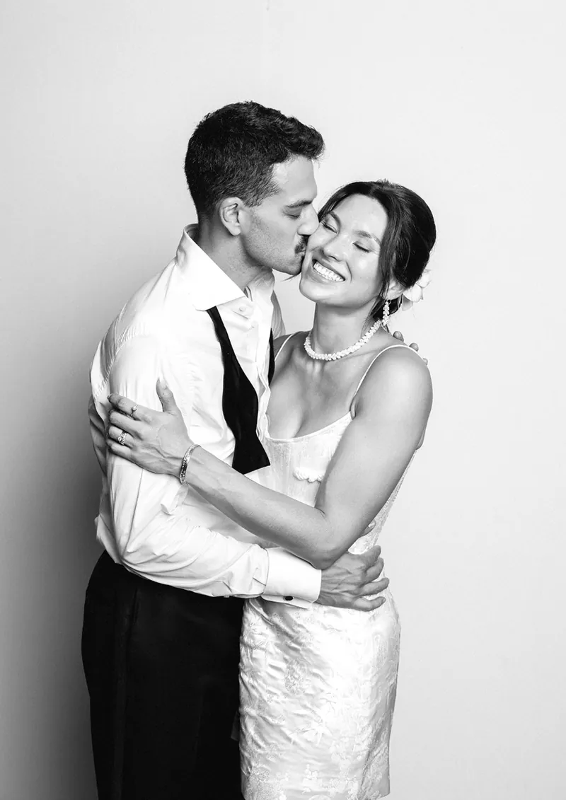 Couple sharing a kiss, black and white